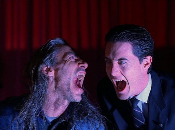 Bob and evil Cooper laughing maniacally in the black lodge