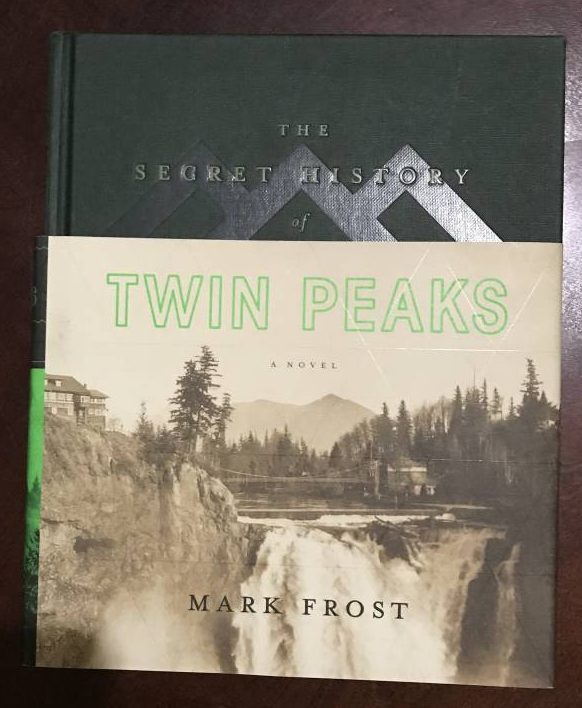 The front cover of The Secret History of Twin Peaks is a green book with a dustover image of the Great Bothern Falls in sepiatone