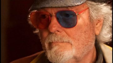 Dr Jacoby wearing red and blue lens glasses