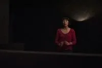 The American Girl/Ronette Pulaski wearing a burgundy sweater