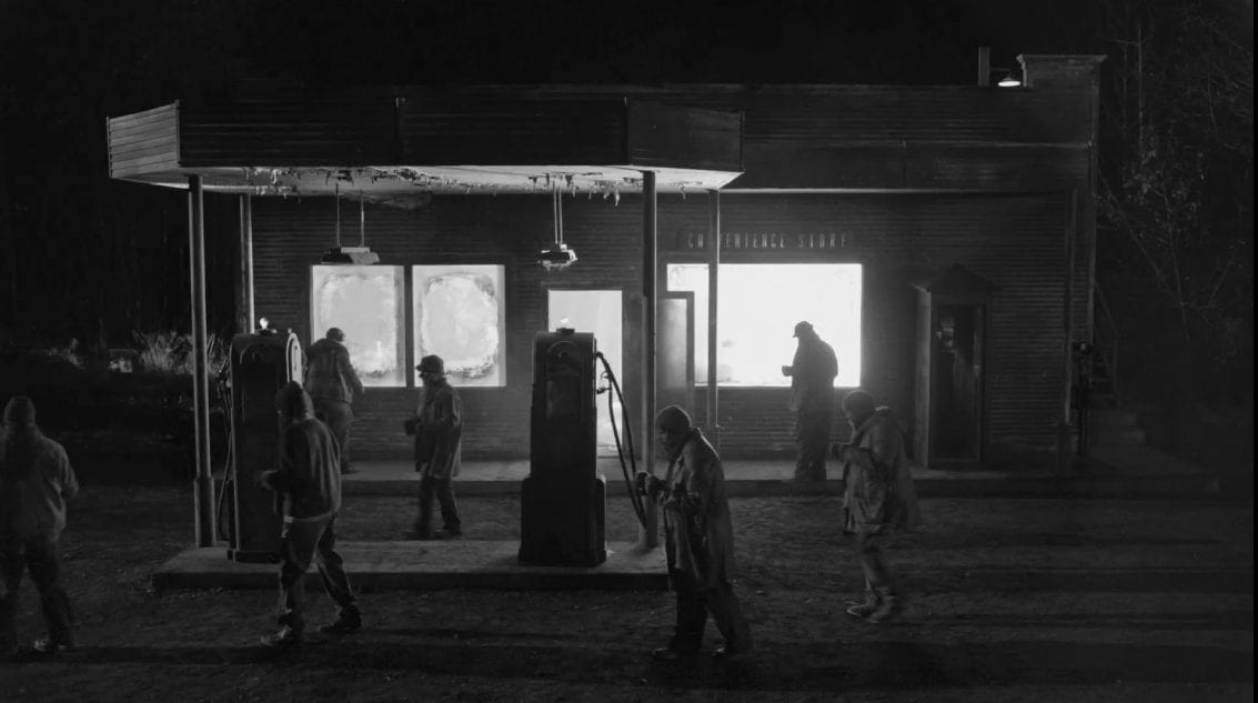 the woodsmen gather outside the convenience store