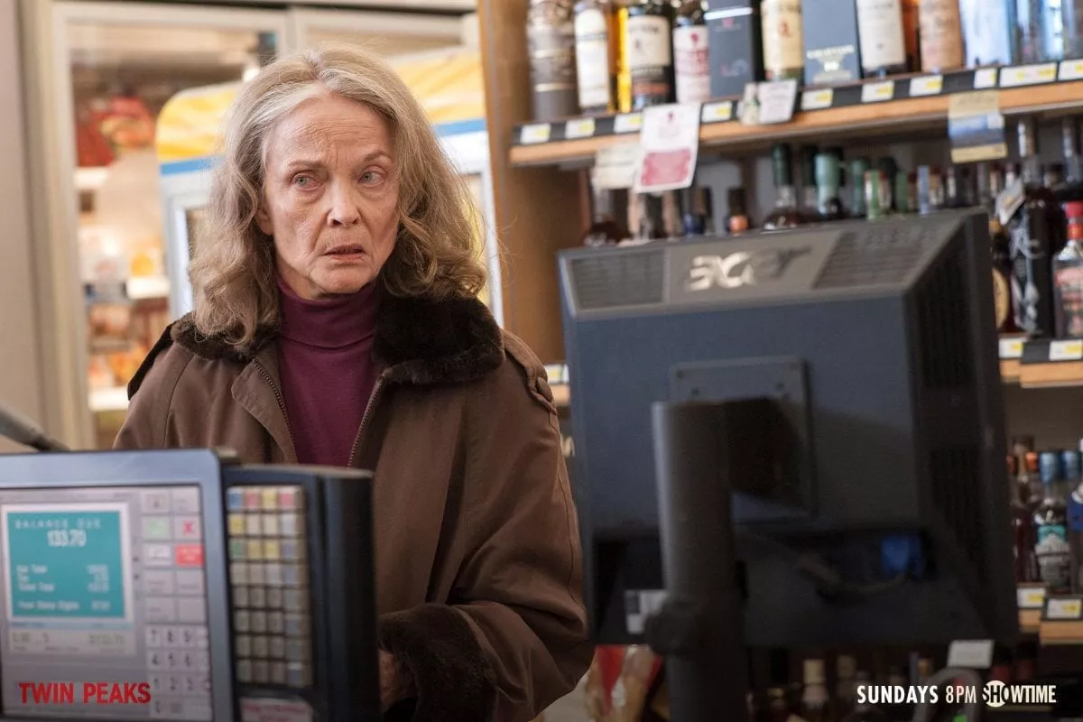 Sarah Palmer looking confused at the check out