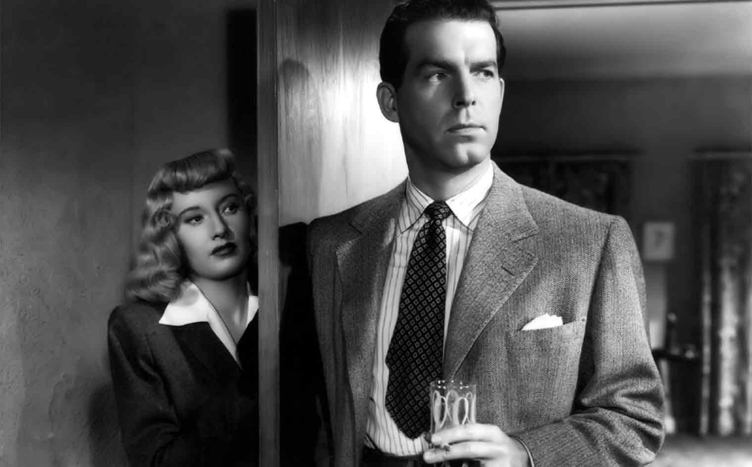 Phyllis Dietrichson (Barbara Stanwyck) and Walter Neff (Fred MacMurray) in Wilder's <em>Double Indemnity</em> (1943).