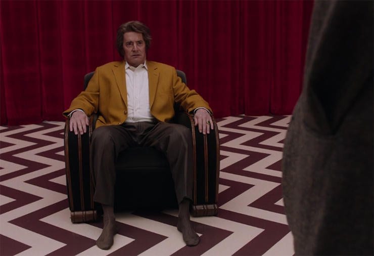 Dougie sits in the chair in the Red Room