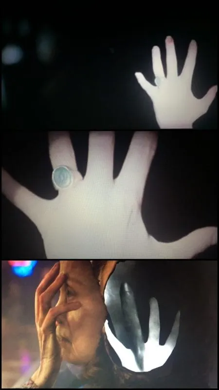 Sarah Palmers face and Laura Palmers hand with the owl ring Sarah Palmers face and Laura Palmers hand with the owl ring