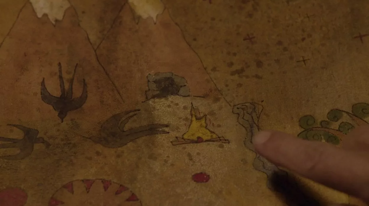 fire on the living map Hawk points to a fire on the living map