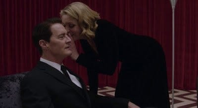 Laura Palmer whispers in Agent Coopers ear