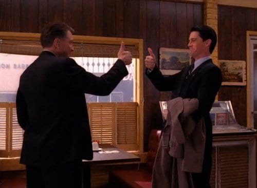 Gordon Cole and Dale Cooper give each other a thumbs up in the Double R Diner