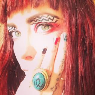 Gisela with Twin Peaks makeup and jewellery