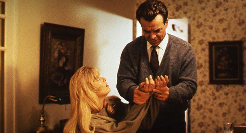 Leland Palmer checks his daughters hands for dirt scaring her