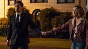 Dale Cooper and Carrie Page hold hands and walk towards the Palmer house