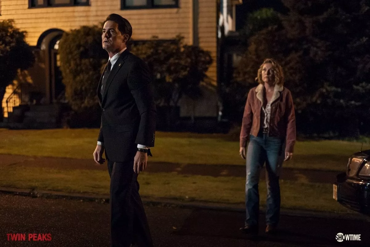 Agent Cooper and Carrie Page approach the Palmer house