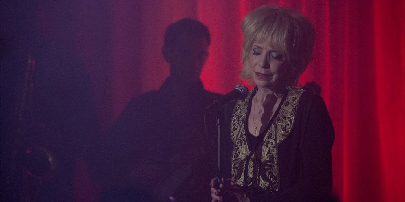 Julee Cruise sings in the red room, the world spins