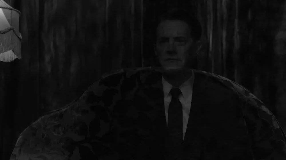 Dale Coopers image flickers then disappears from his chair