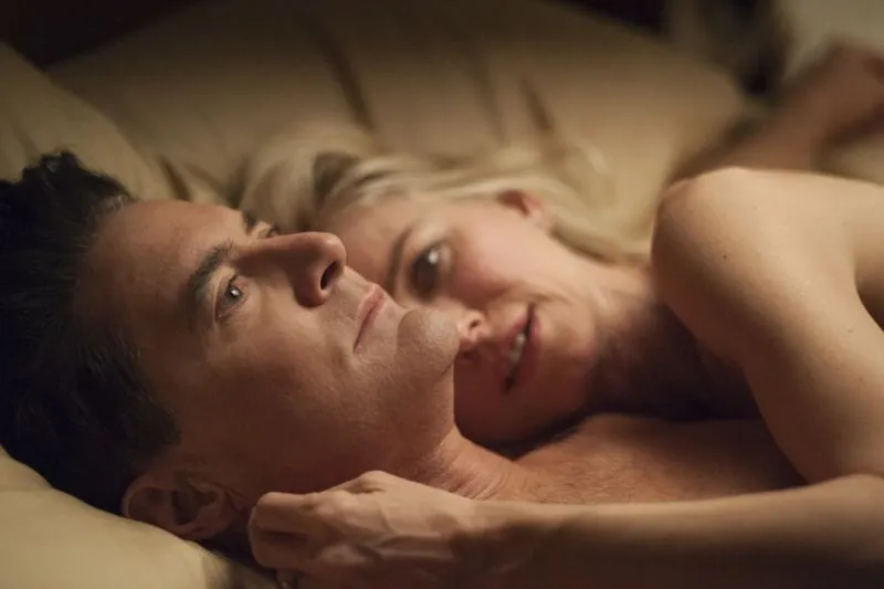 Dougie and Janey-E lie in bed naked in each others arms after sex