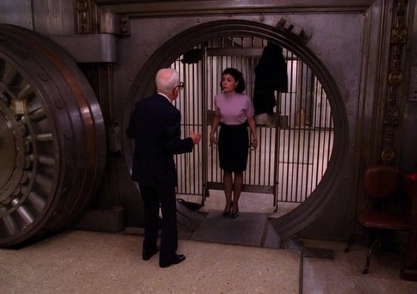 Audrey has herself chained in protest inside the Twin Peaks bank