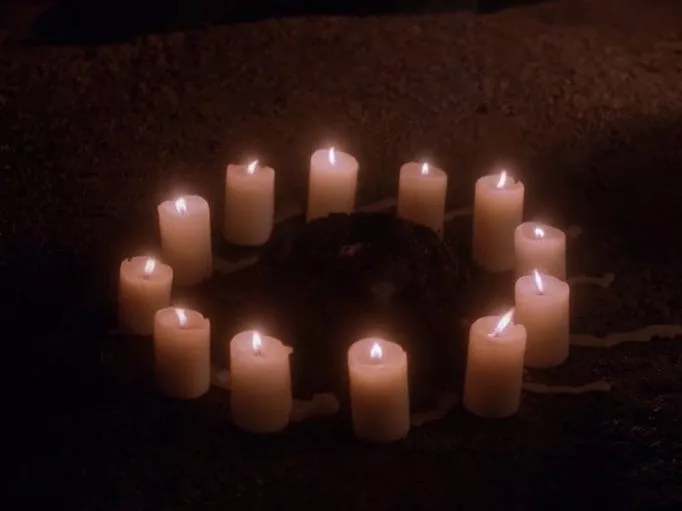 12 candles burning in a circle