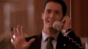 Cooper talking on the phone