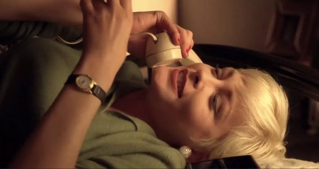 Teresa Banks Teresa Banks lies in bed on the phone, smiling