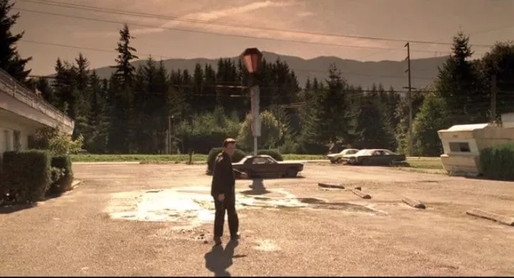 Leland walks away from the Red Diamond Motel