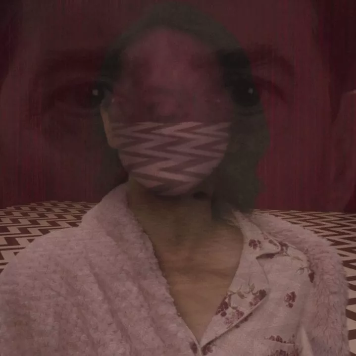 Naido with the red room design on her face