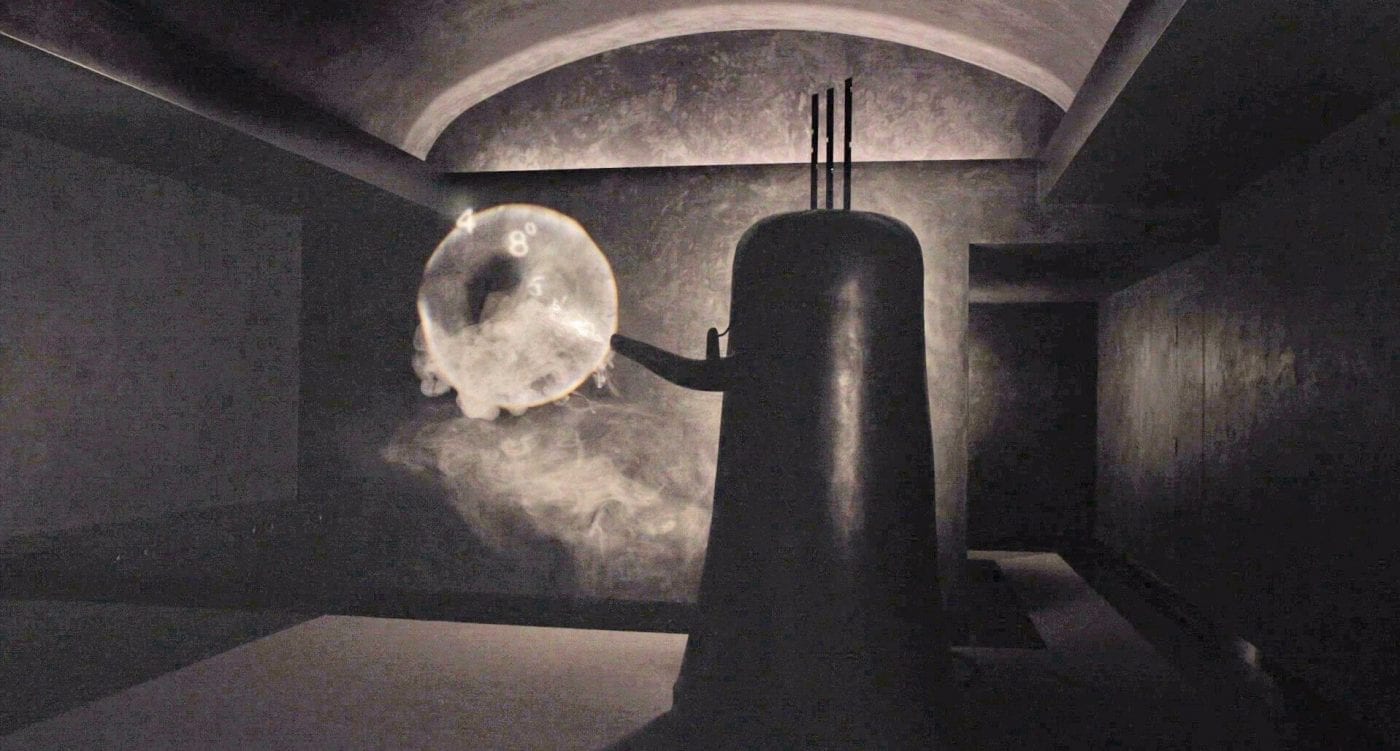 The Jefferies metal tea kettle device emitting a cloud of smoke and a series of numbers