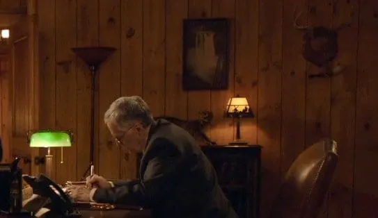 Benjamin Horne Benjamin Horne at his desk with a photo of the falls on the wall
