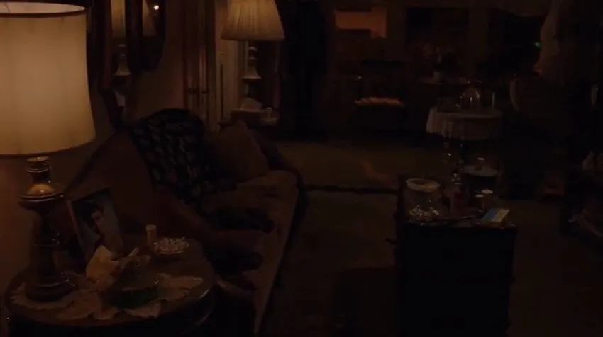 Sarah Palmer tries to smash the picture of her daughters prom photo but it won't break