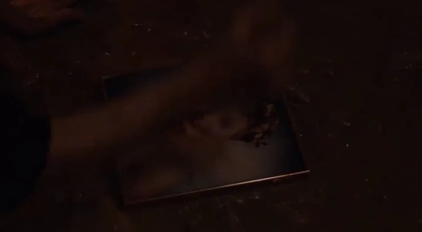 Sarah Palmer tries to smash the picture of her daughters prom photo but it won't break