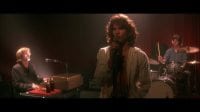 Val Kilmer as Jim Morrison in The Doors