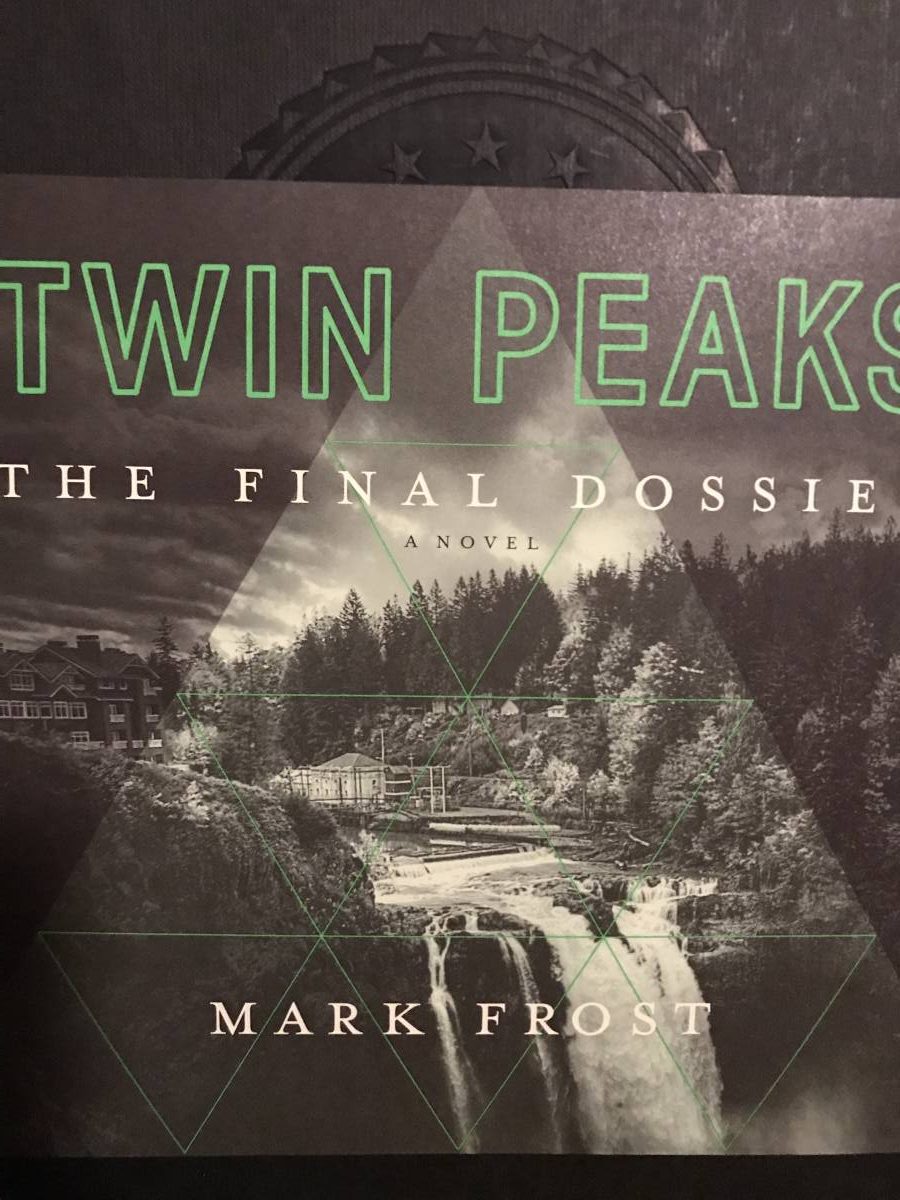 The front image of the Final Dossier dust cover show an image of the Great Northern’s waterfall framed in the center of a lighter triangle.