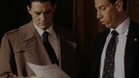 Albert Rosenfield and Dale Cooper look at documents