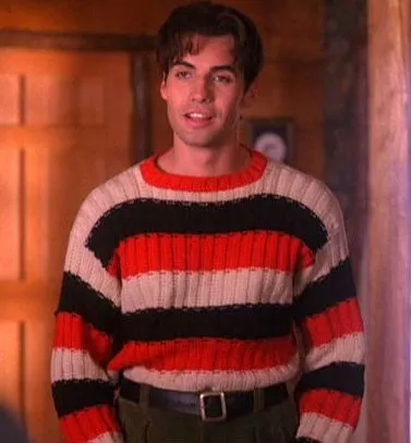 John Justice Wheeler wearing the greatest sweater known to man