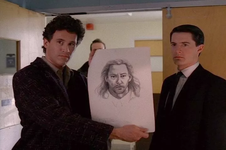 Sheriff Harry Truman reveals a drawing of BOB