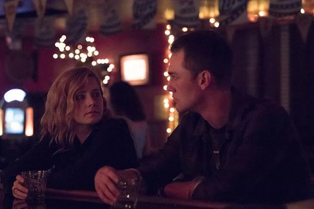 Camille and John share a drink at the bar in Sharp Objects