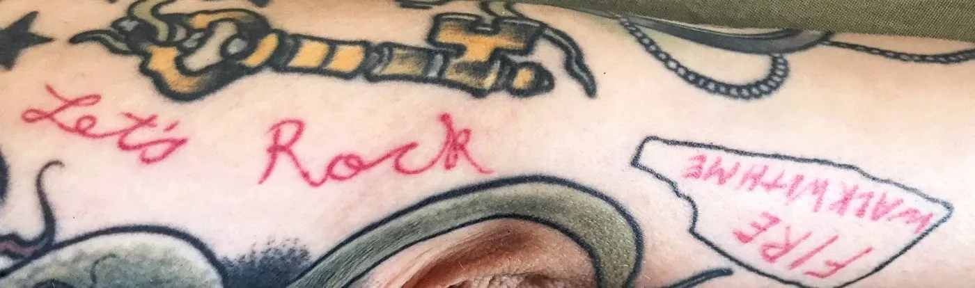 Gisela's Let's Rock tattoo