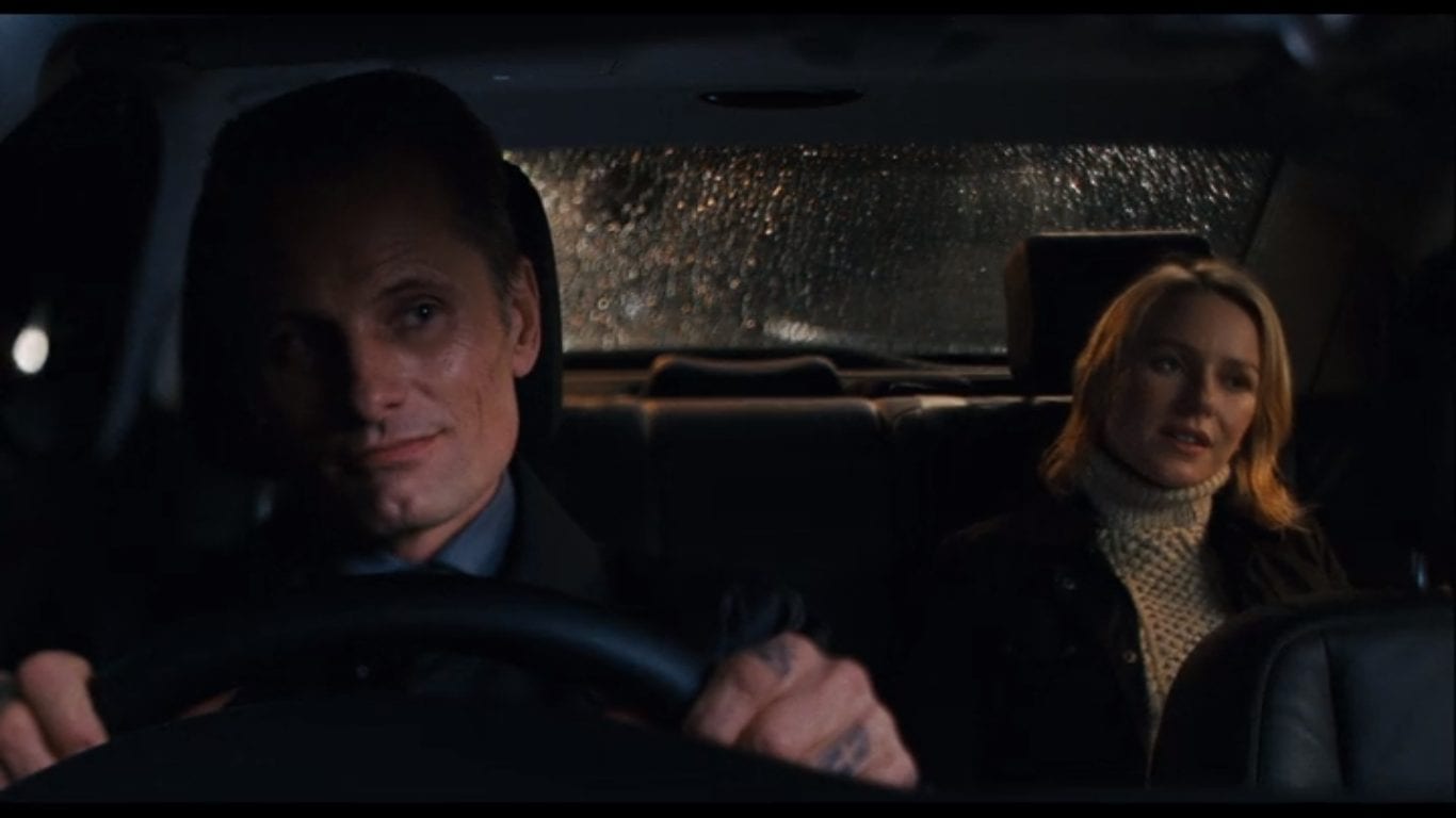 Naomi Watts rides in the back of a car with Vigoo Mortensen driving in Eastern Promises