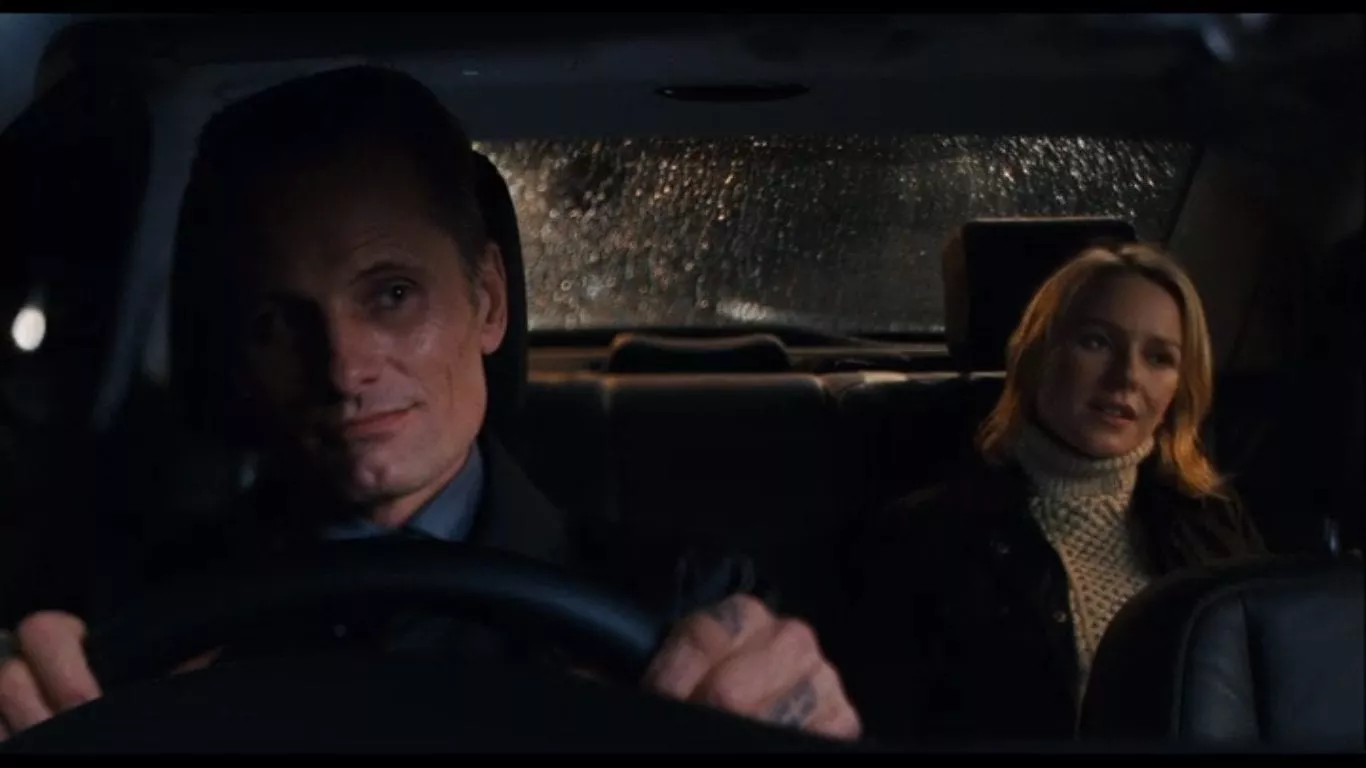 Naomi Watts rides in the back of a car with Vigoo Mortensen driving in Eastern Promises