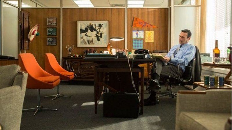don draper sits alone in his office