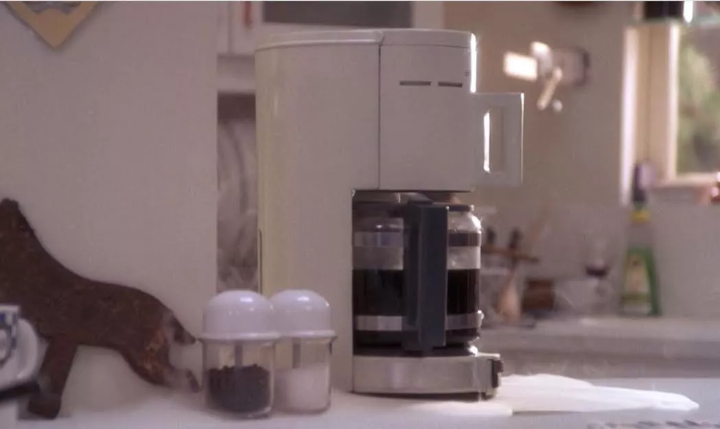 Black coffee representing Black Magic in The Believers, 1987