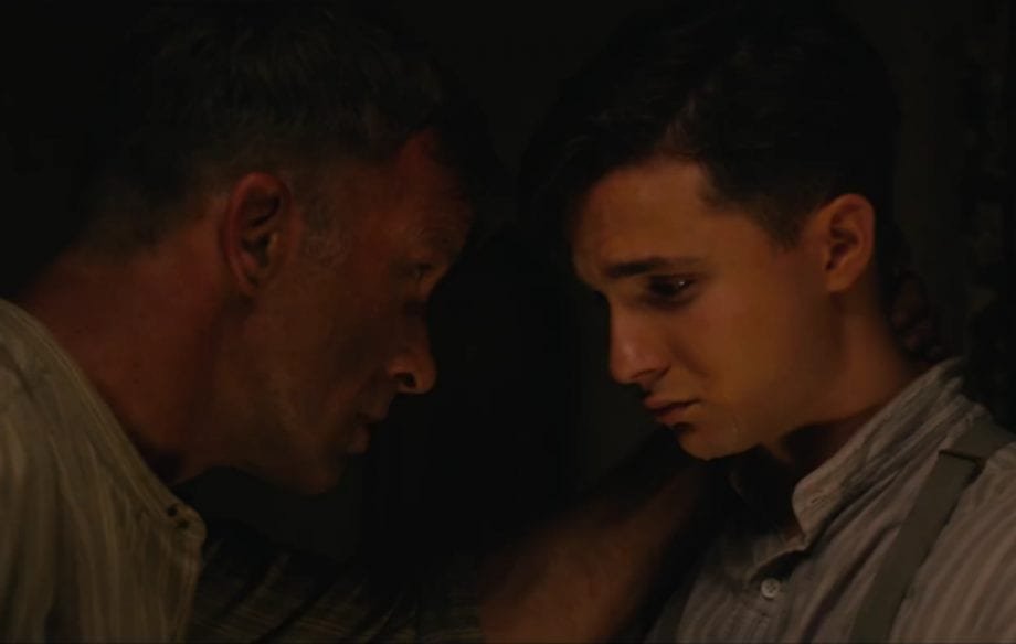 Wilfred comforts Henry after their ordeal in 1922