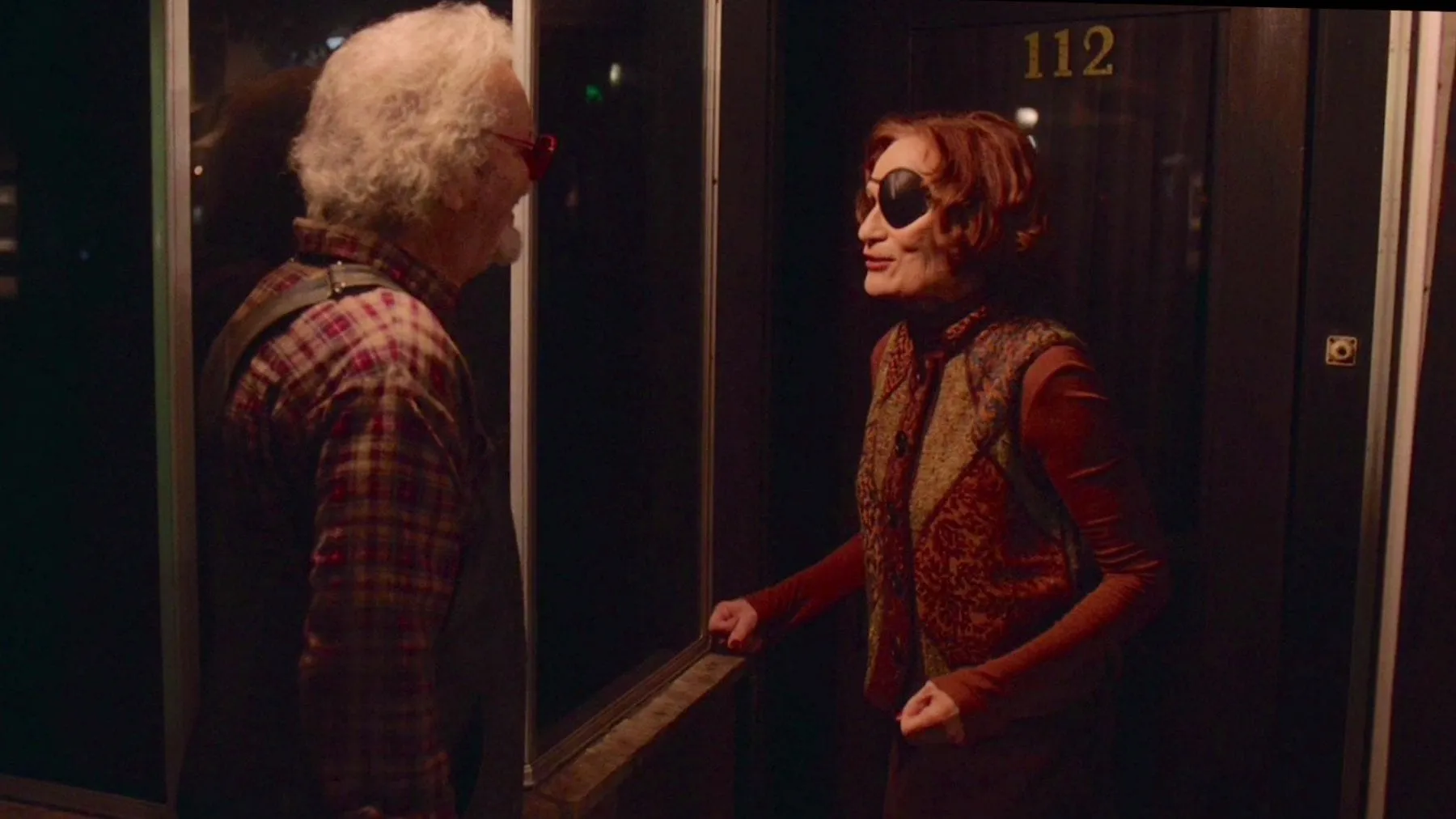 Jacoby meets Nadine outside her store and she shows him the golden shovel in her window.