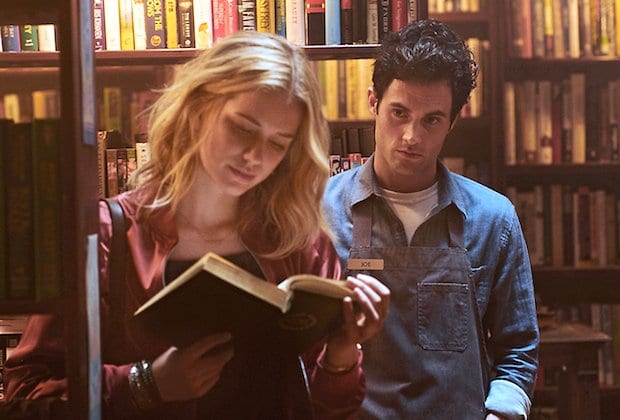 Joe eyes Beck while she reads a book in Lifetime's You