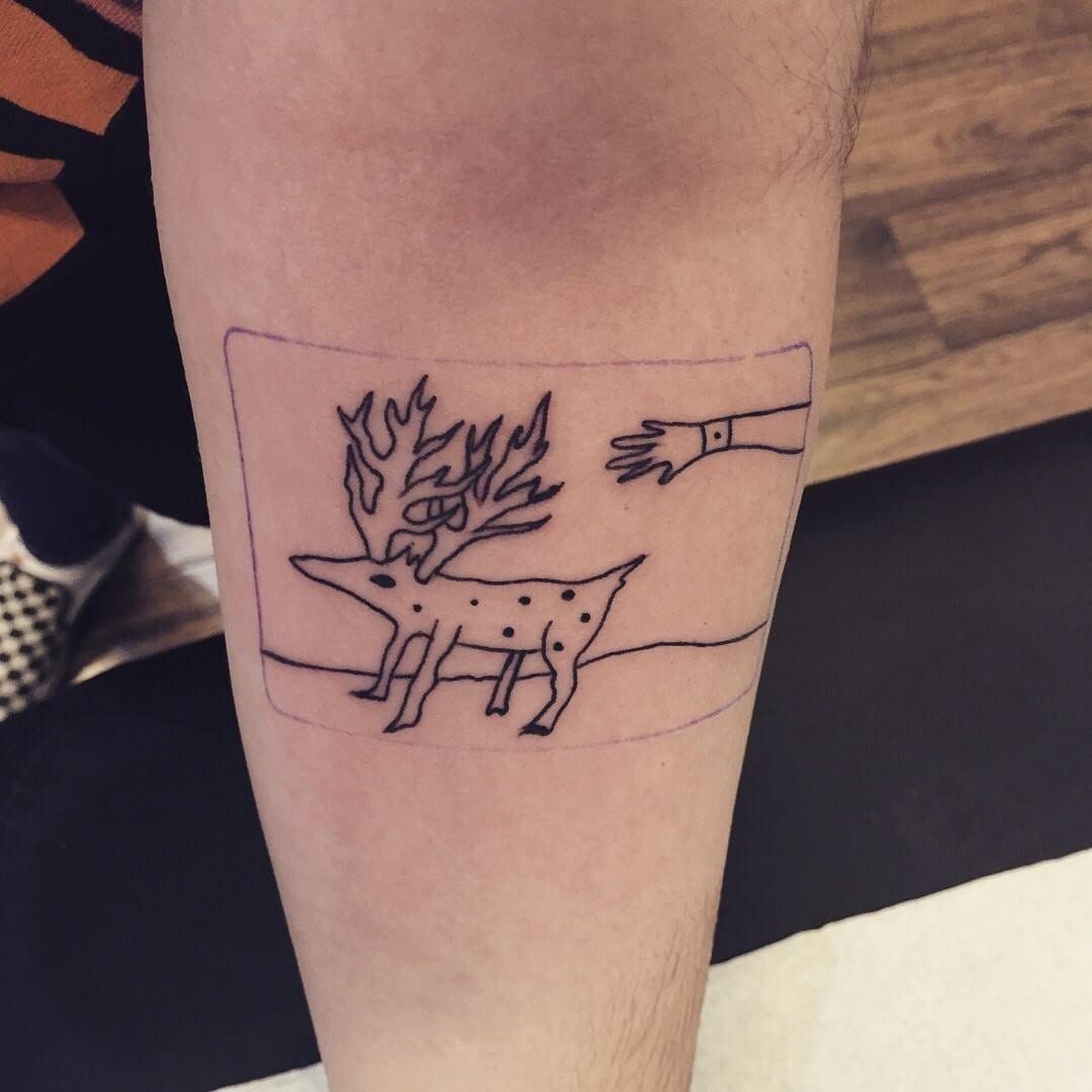 a tattoo of Gordon Cole's deer-like doodle