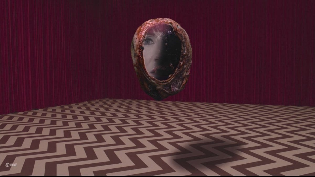 Dianes face within a blackened orb in the black lodge