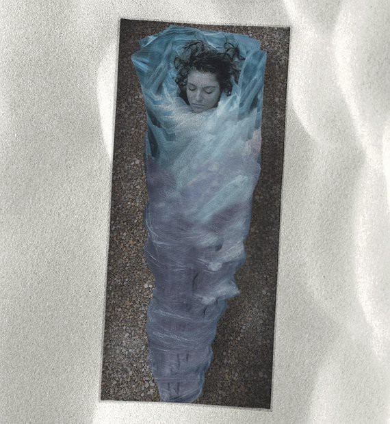 Laura Palmers body, wrapped in plastic 