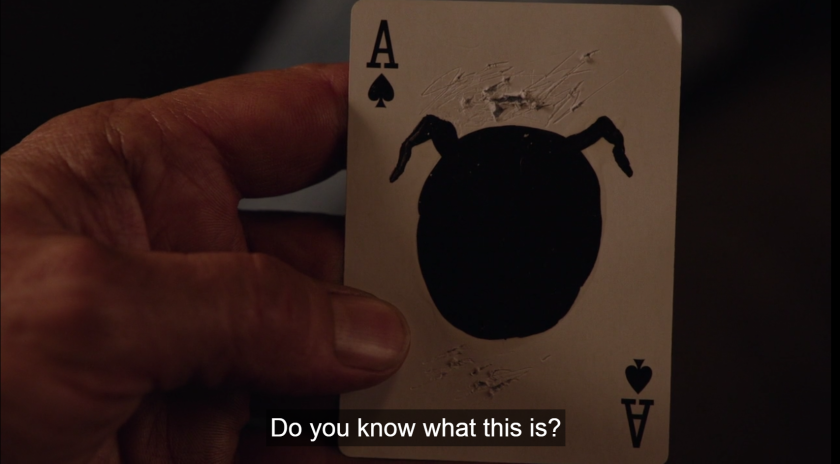 An ace of spades with ears drawn on it, along with a subtitle reading, "Do you know what this is?"