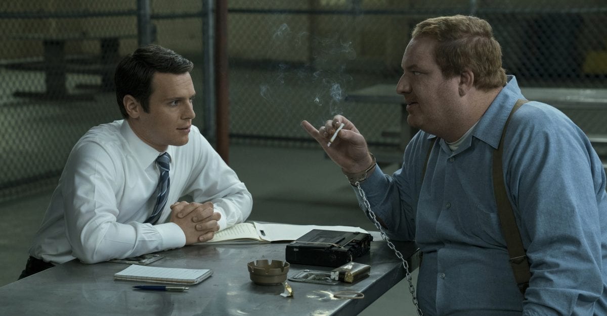 Holden Ford (Jonathan Groff) interviews serial killer Jerry Brudos (Happy Anderson) in Mindhunter Season 1