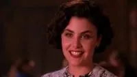 Audrey Horne smiling at Cooper