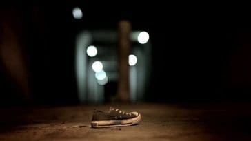 A lone sneaker at the entrance to the tunnel in Absentia